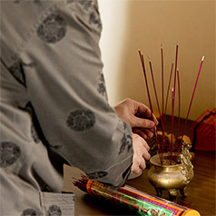 lighting incense at the Altar Ceremony, CNY 2023